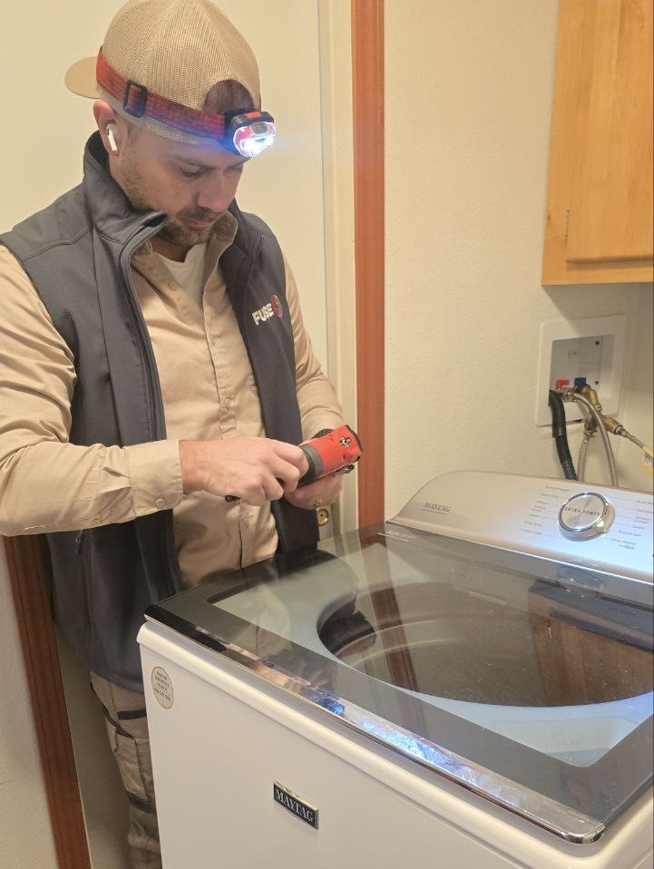 technician doing appliance repair carmel valley