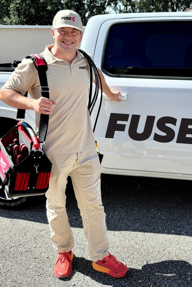 Fuse Tech beside a truck Refrigerator Repair Monterey