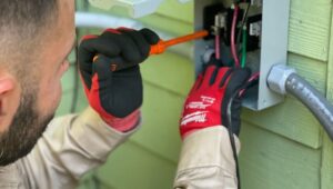 an electrician fixing Electrical problems at home