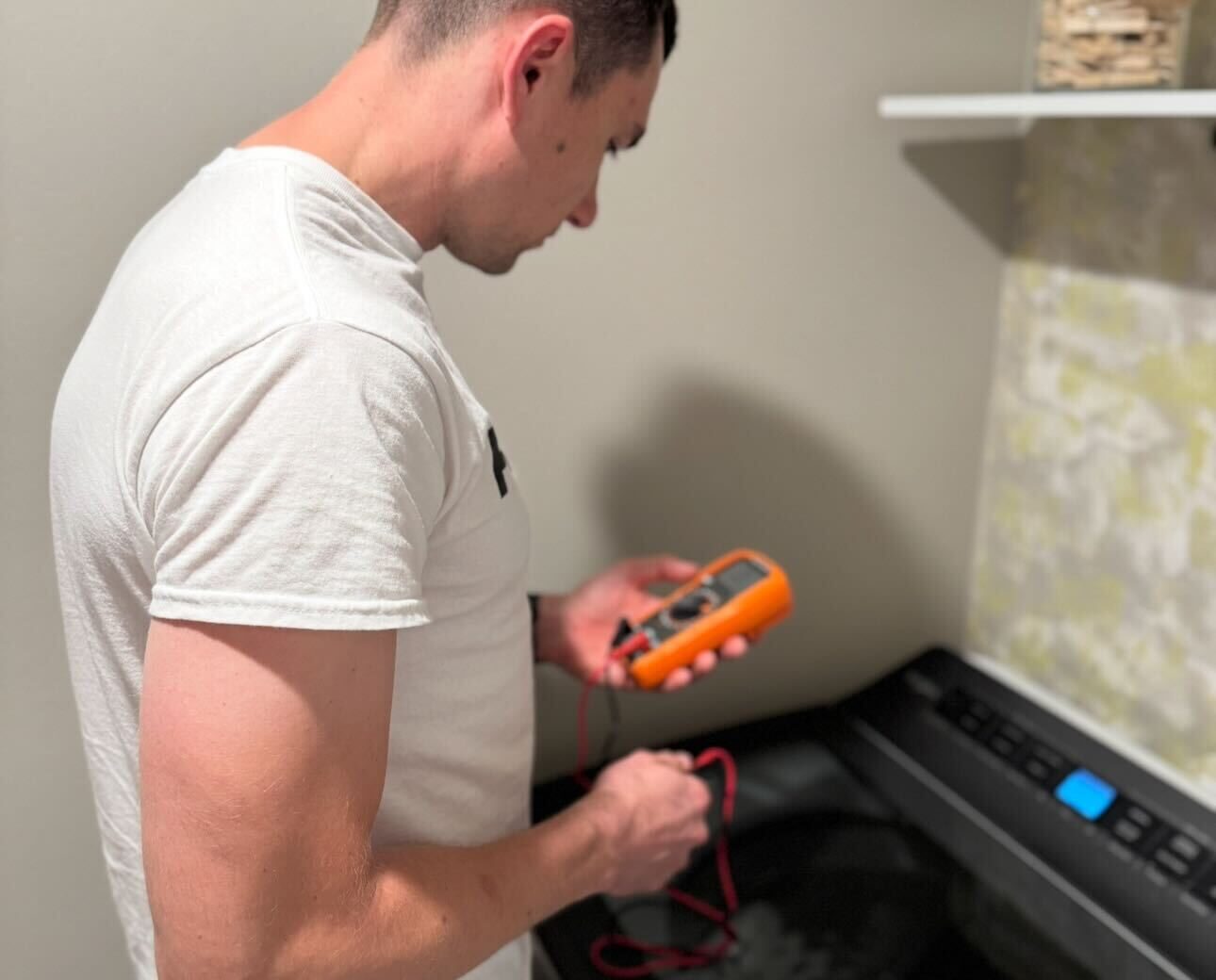 electrician carmel valley checking on appliance