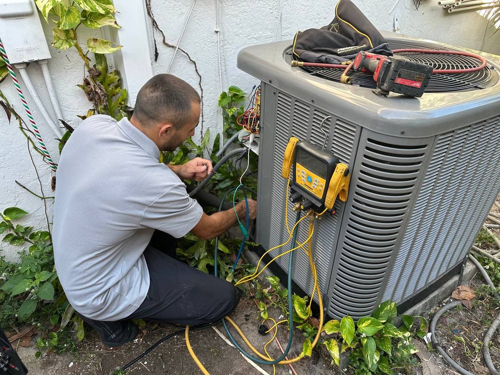 technician repairing heat pump salinas ca