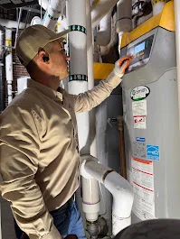 monterey water heater services technician installing tank unit